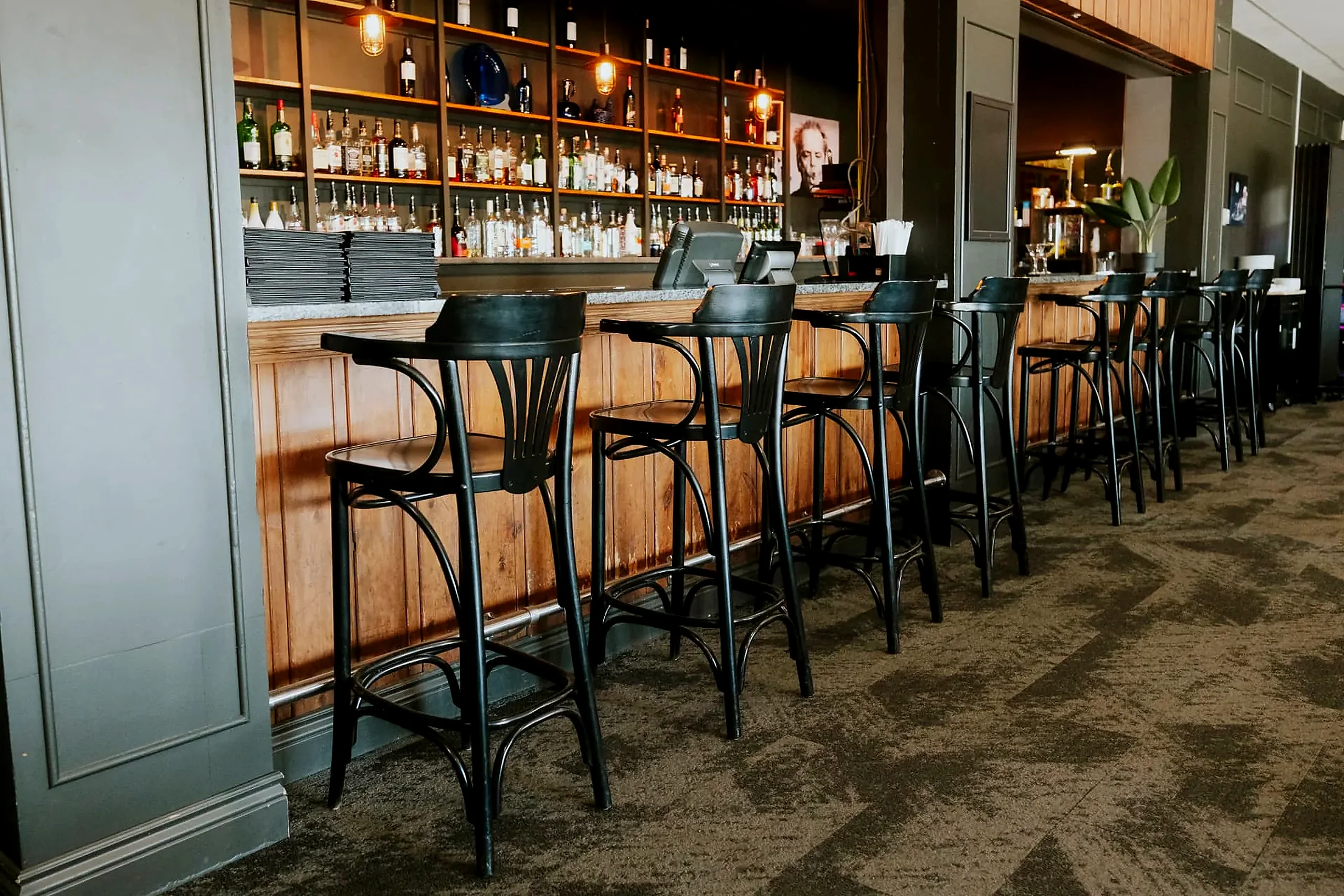 A seat at the bar Row of stools along the bar at the Wabush Hotel, open until midnight