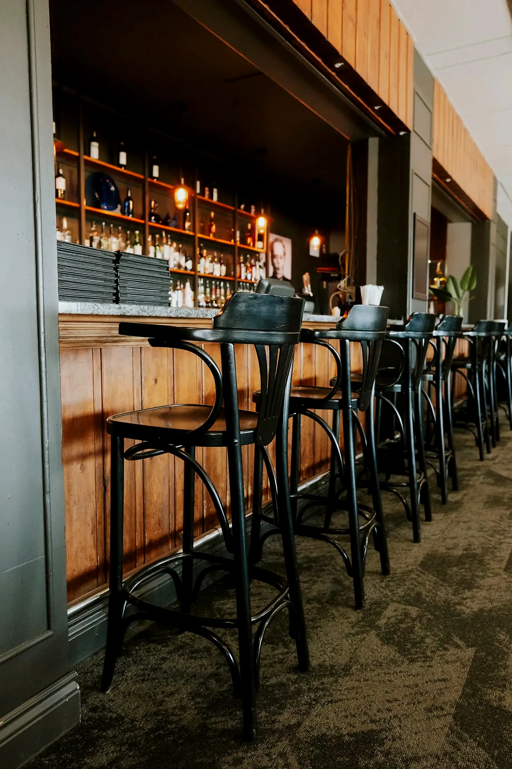 The bar, evenings Stools lined along the hotel bar, open in the evening after a day outdoors