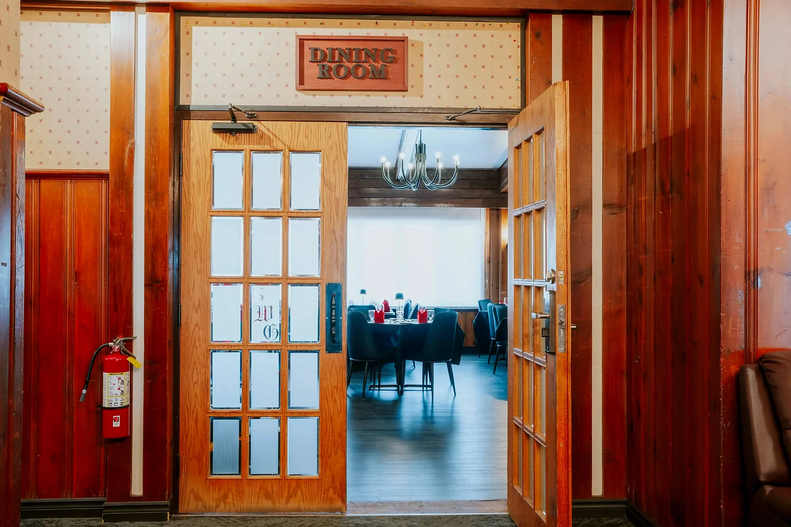 The Grenfell Restaurant doors opening onto tables set for service